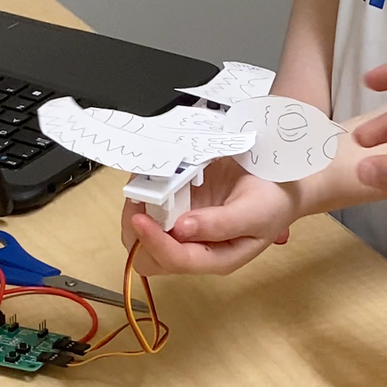 Ryan's double-winged bird puppet with flapping wings driven by the Audio Board